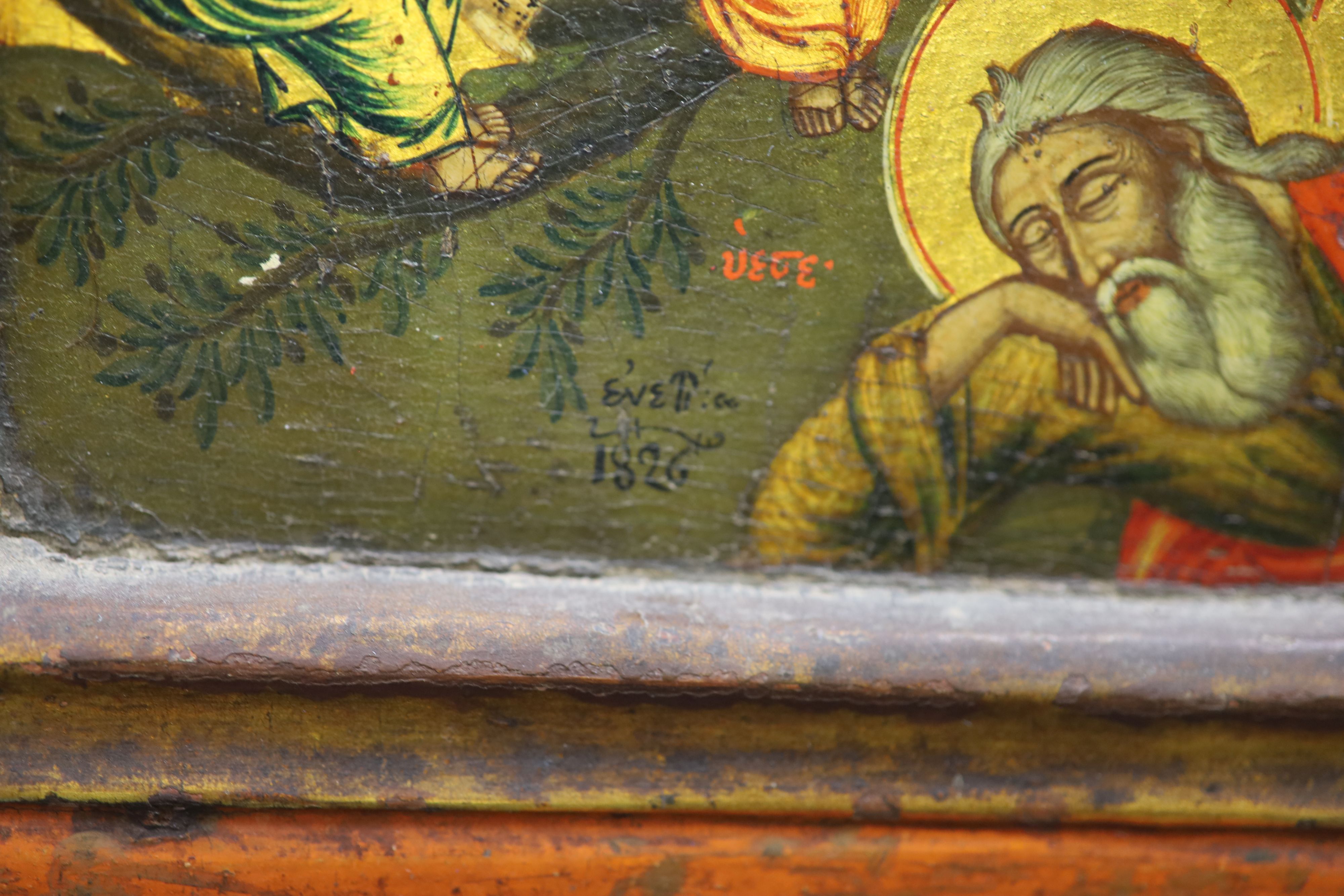 An early 19th century tempera on wooden panel icon, 22 x 18.5in.